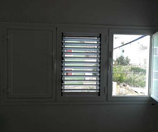 Cambiar ventana de madera por una de aluminio en Las Palmas