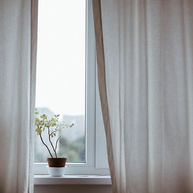 Poner una cortina, una manera de dotar de personalidad a tu casa