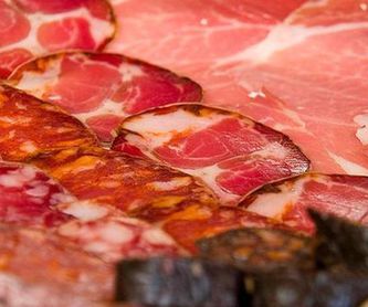Raciones y Carne: Especialidades y Platos de Bar Bodegas Leyre