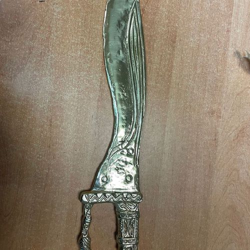 Falcata de bronce