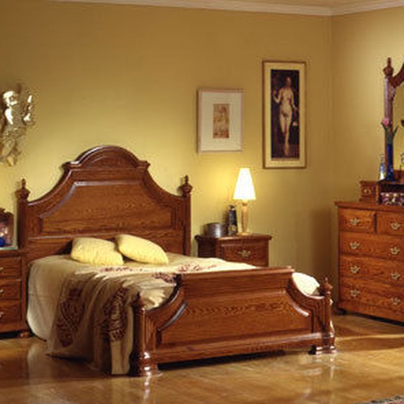 Dormitorio en madera maciza de roble.