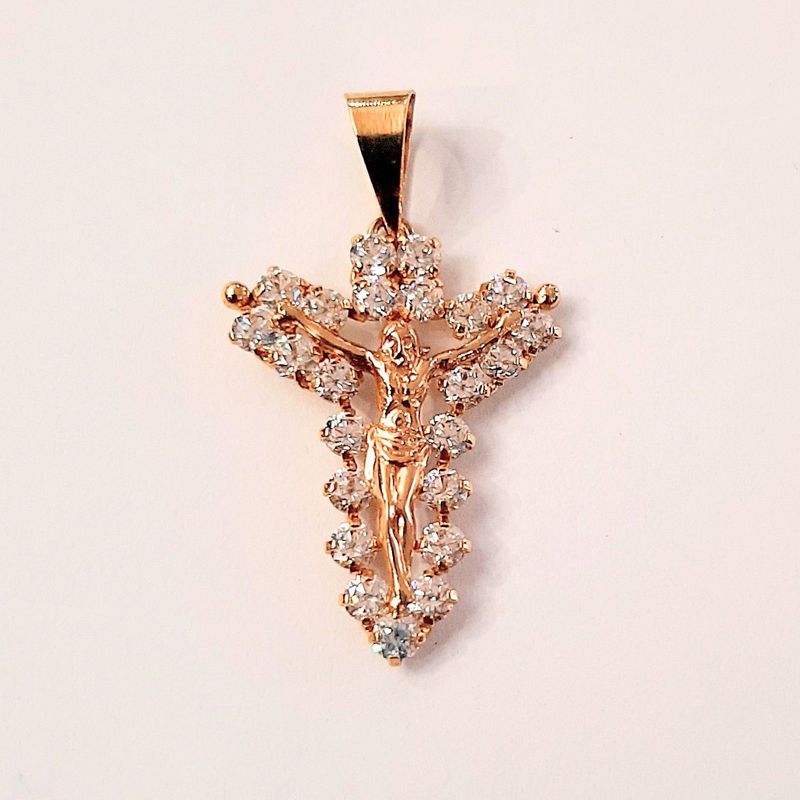 Colgante de oro y lo hacemos con esta cruz fundida en oro 18k: Catálogo de Joyería Izquierdo