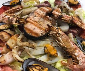 Pescados y mariscos a la brasa en Badajoz