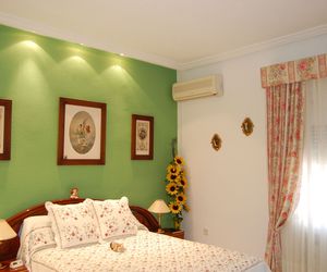 Habitación pintada con tonos verdes