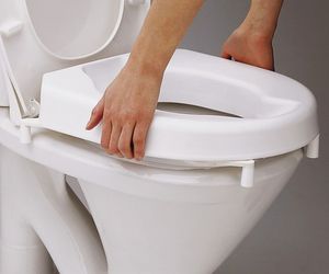Elevador de WC ajustable a la mayoría de sanitarios