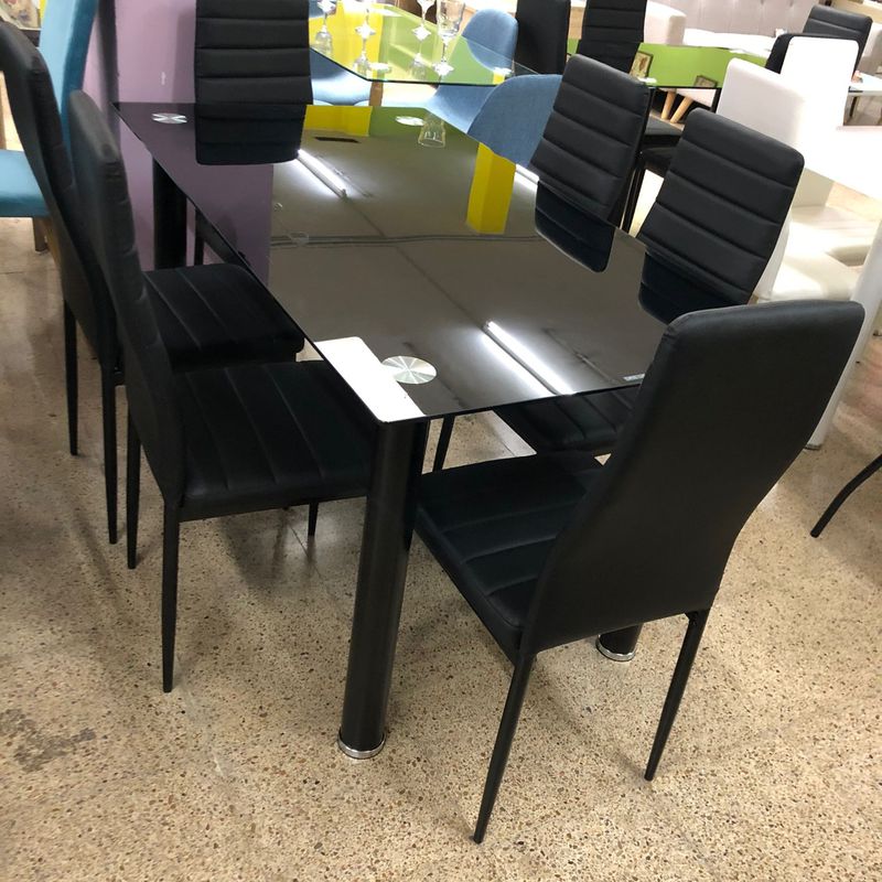 Mesa de cristal  y 4 sillas negras: Productos de Remar Castellón