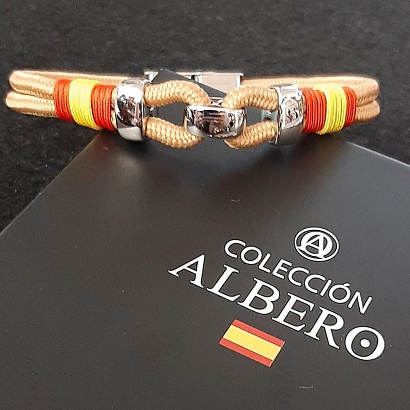 Acero y cordón. España: Catálogo de Joyería Izquierdo